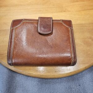 Chunky vintage Tusk brown leather wallet. Cool hardware. Quality craftsmanship.